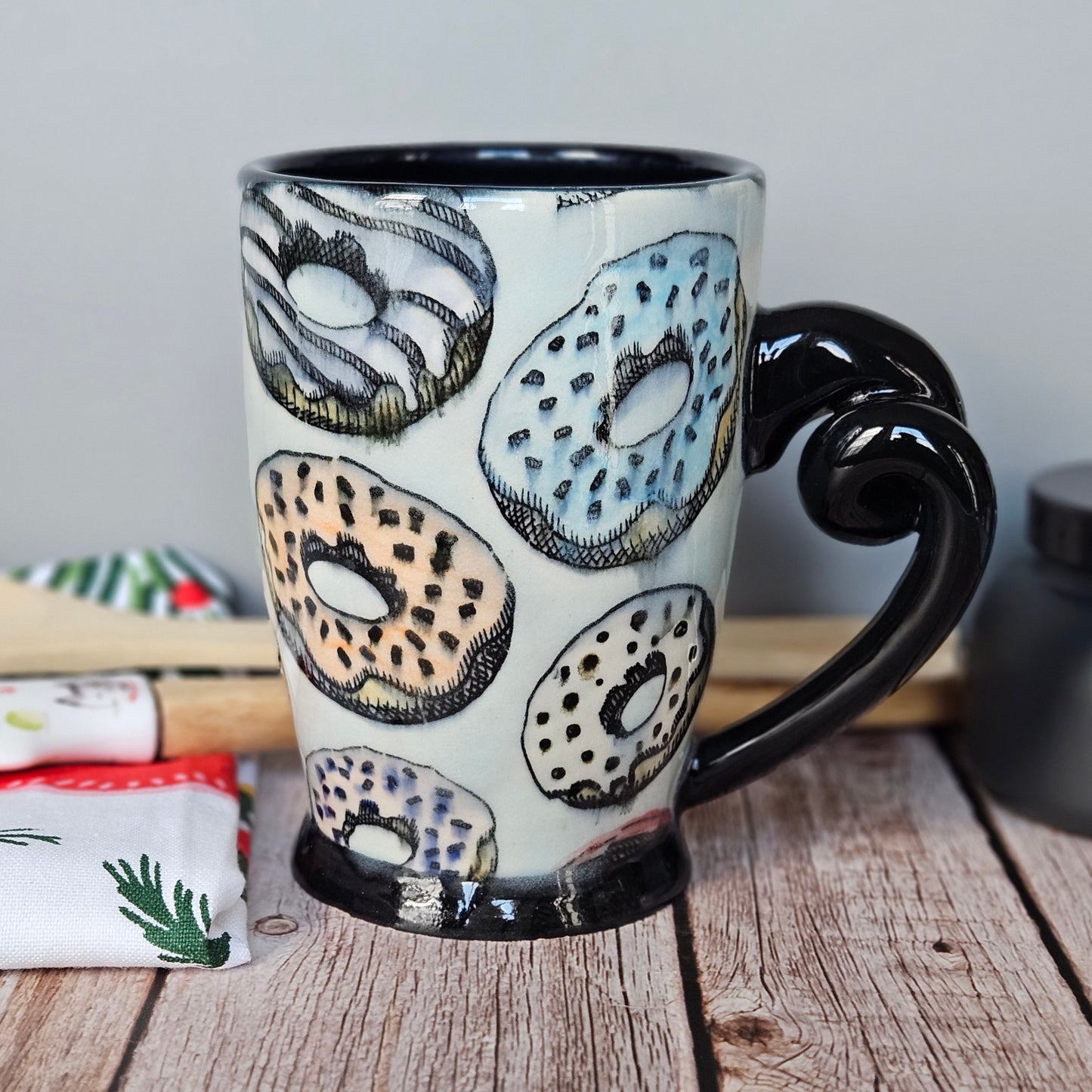 Light blue donut mug with pigtail handle, 10 oz.