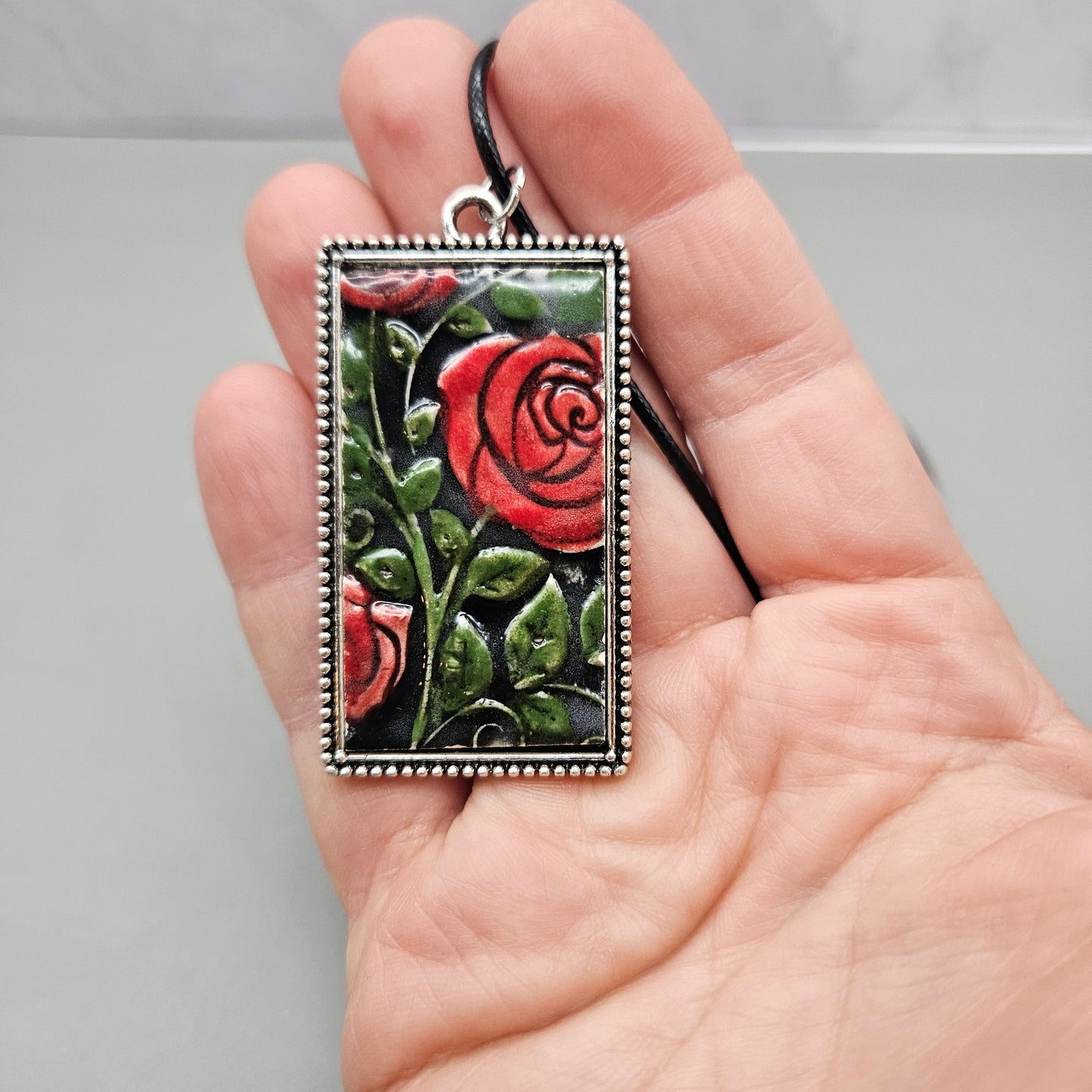 2 inch by 1 inch rectangle pendants with metal frame