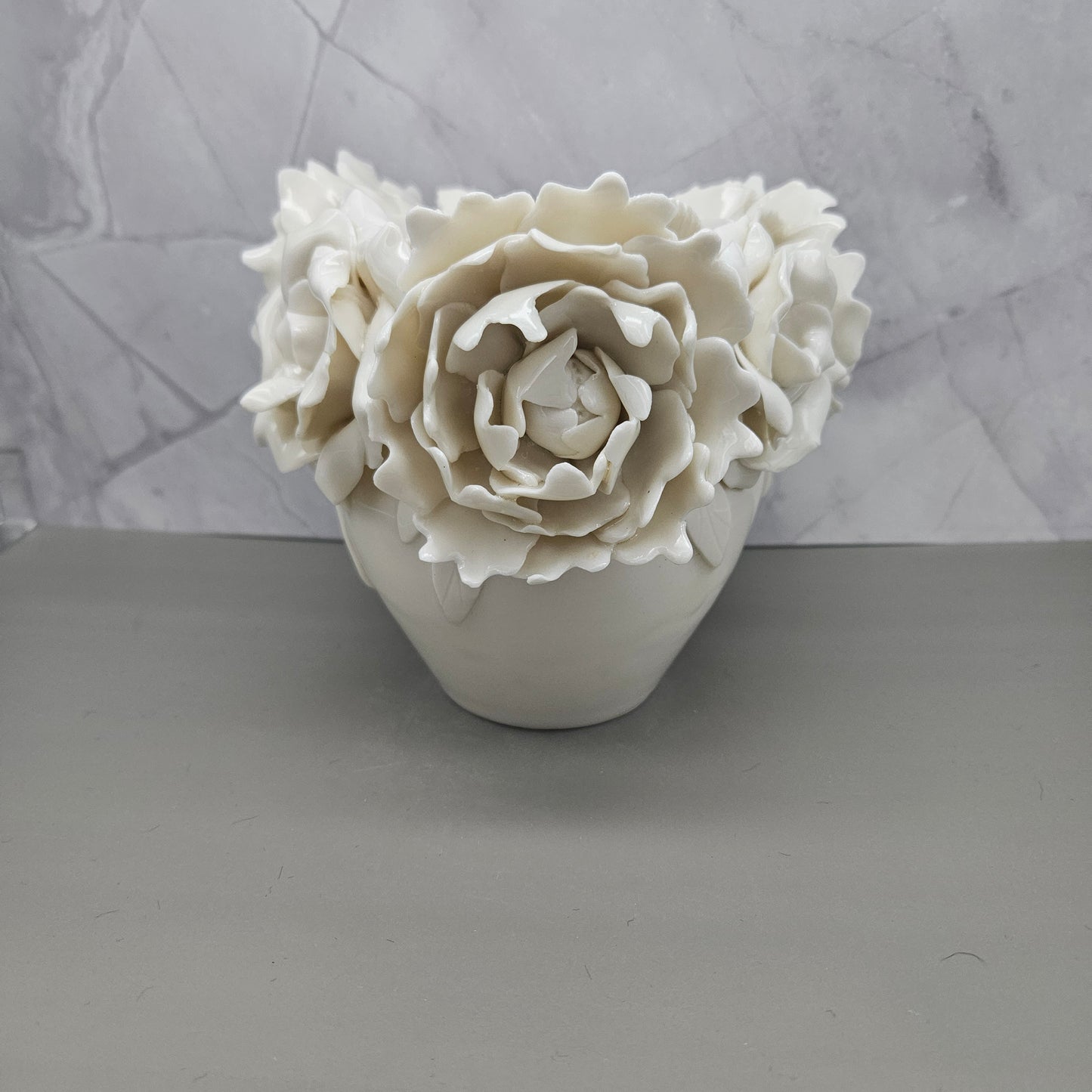 White frost vase with handmade flowers, standing 5 inches tall