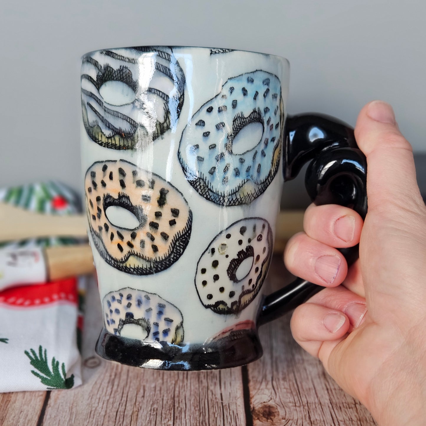 Light blue donut mug with pigtail handle, 10 oz.