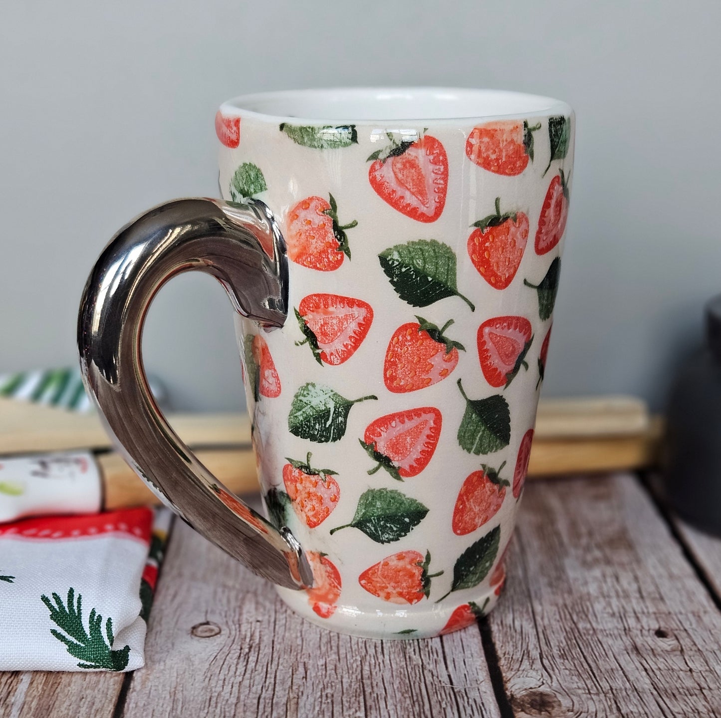 White and red strawberry mug with 22k white gold handle