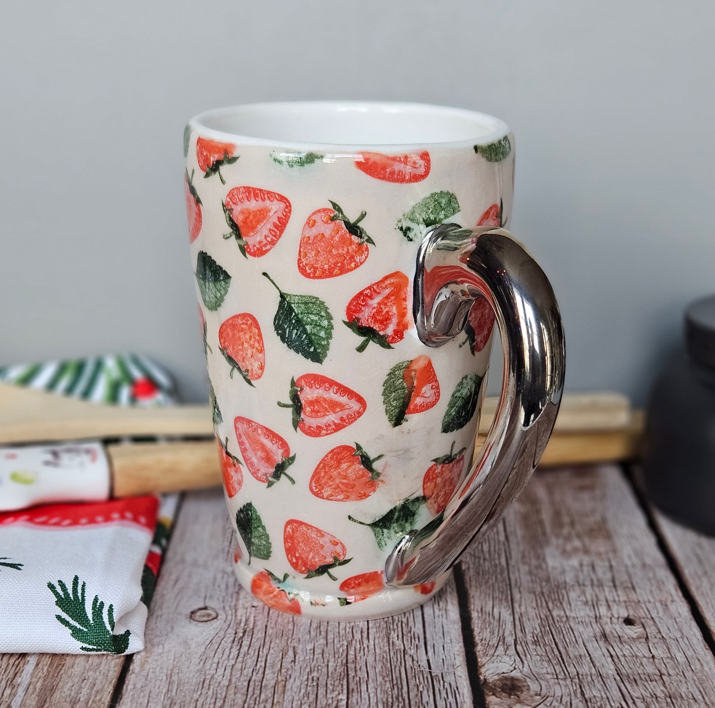 White and red strawberry mug with 22k white gold handle