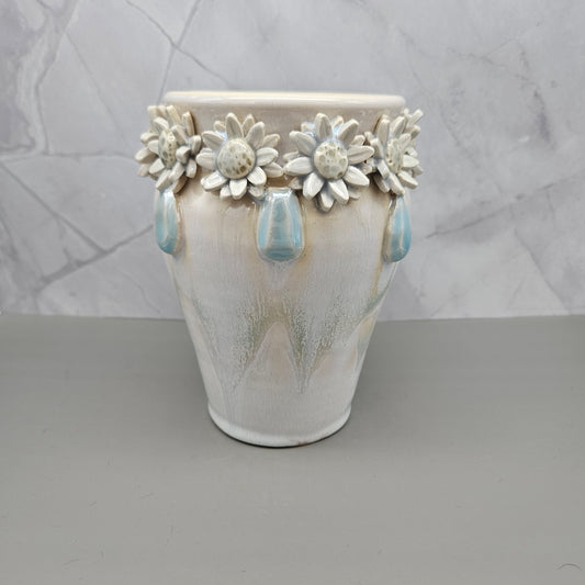Light blue and white marbled vase with blue mother of pearl jewels