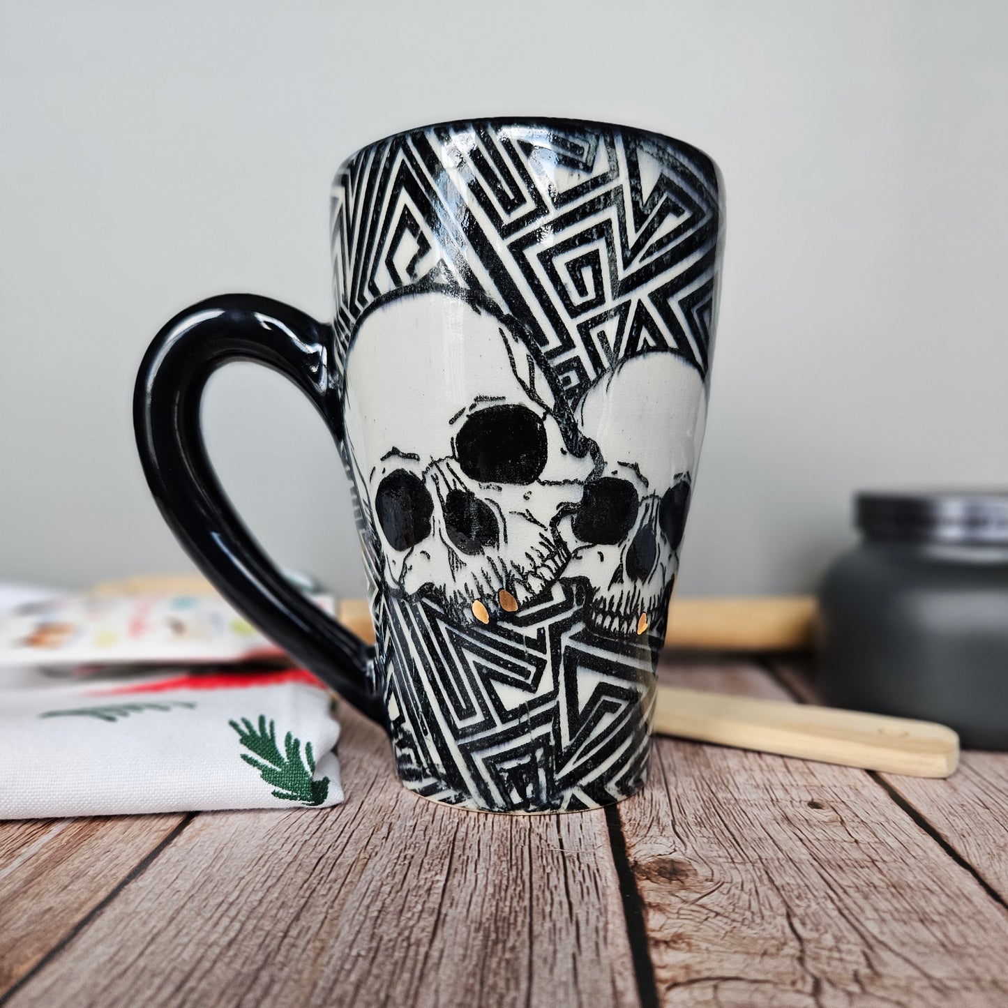 Black and white maze skull mug with 22k gold teeth, 10 oz.