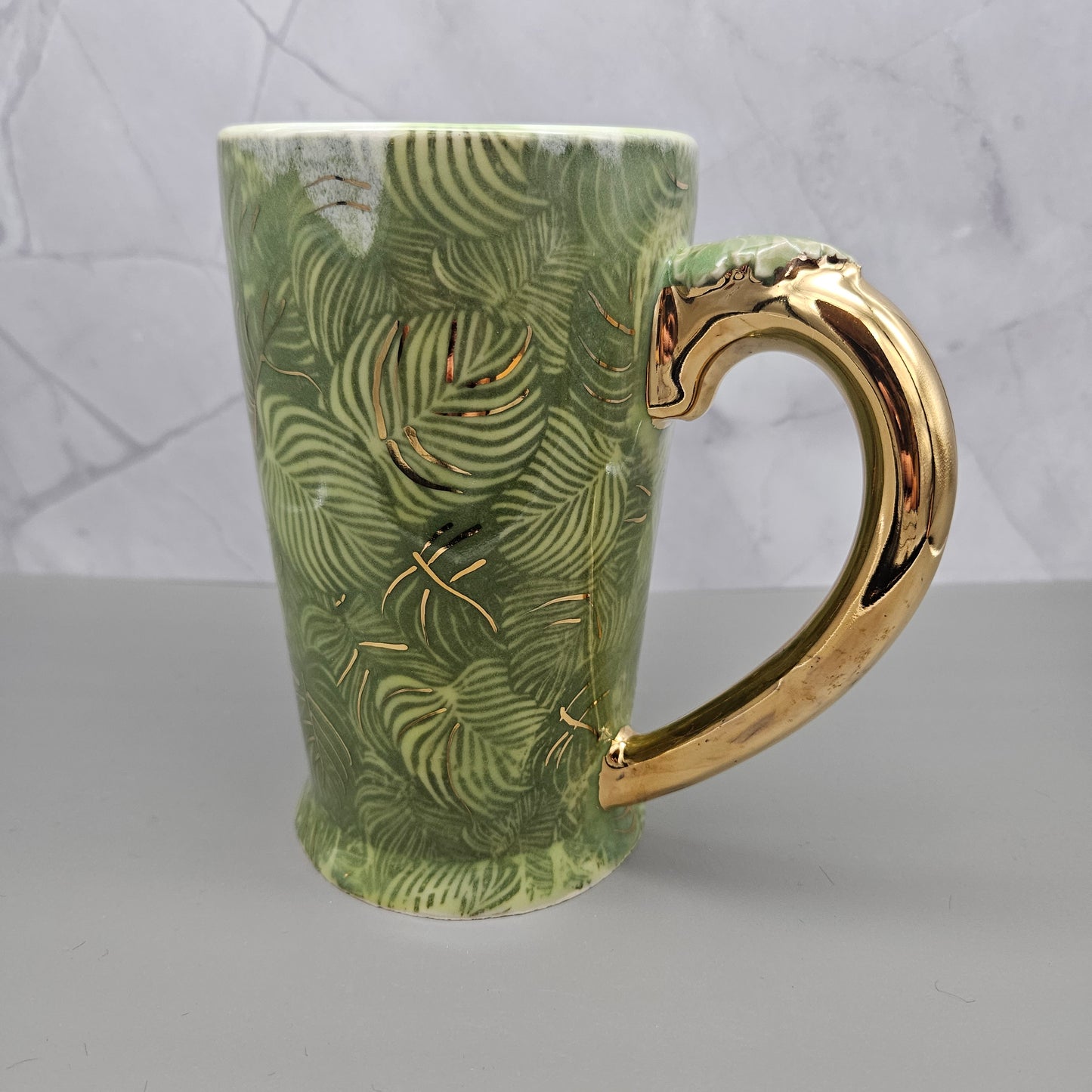 Green palm mug with 22k gold accents and handle