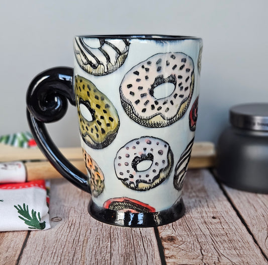 Light blue donut mug with pigtail handle, 10 oz.