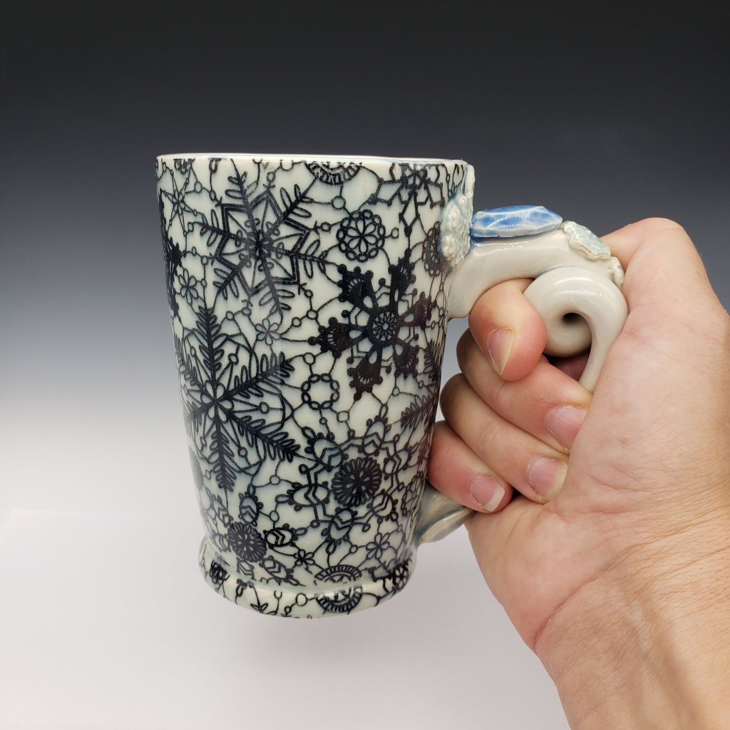 Light blue vintage lace snowflake mug with detailed twist handle