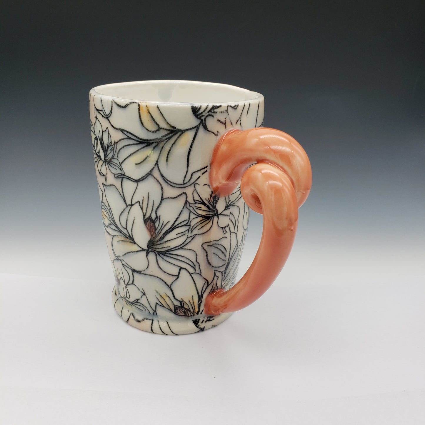 Pink and white Magnolia mug with pink twisted handle