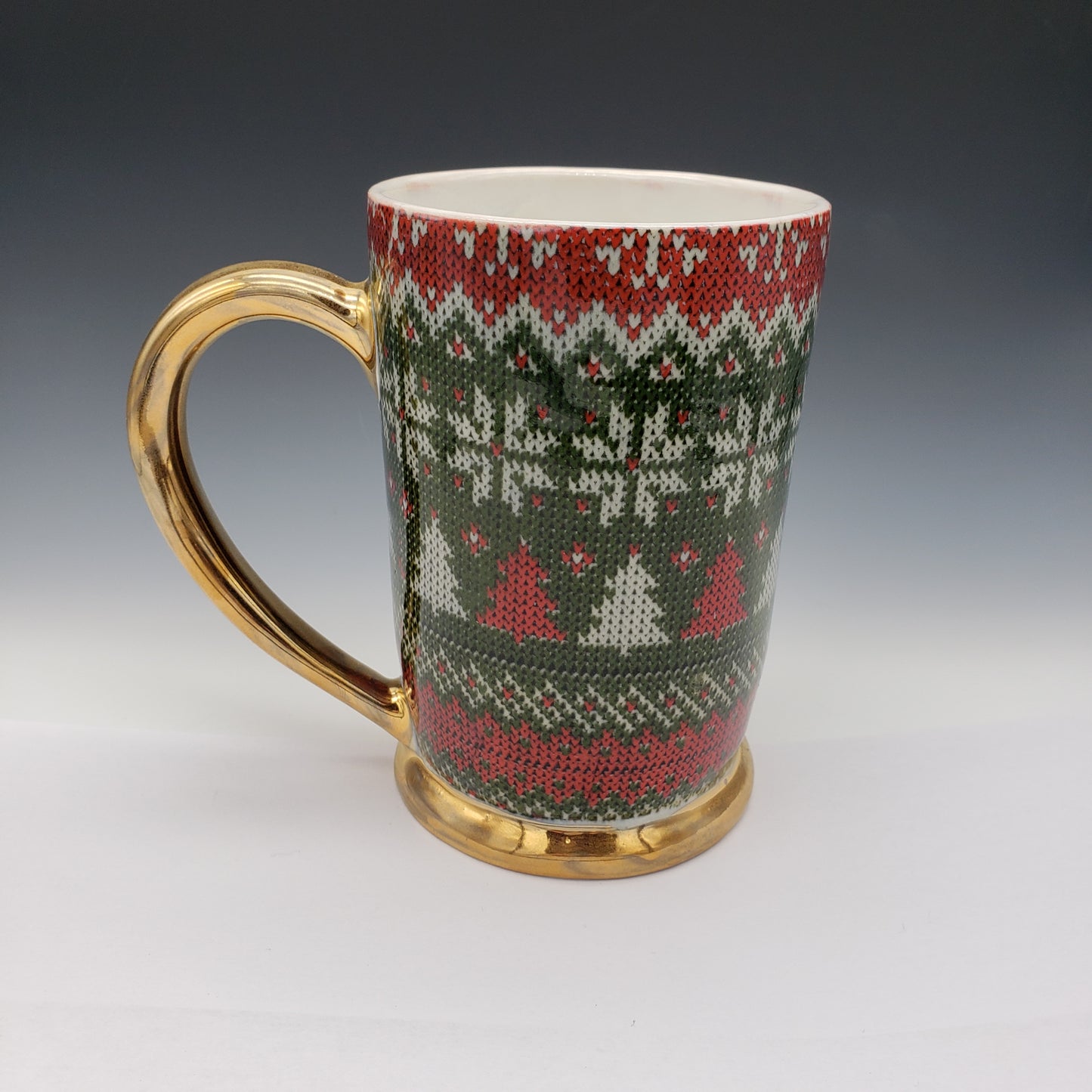 Red and green ugly sweater mug with 14k yellow gold handle and base